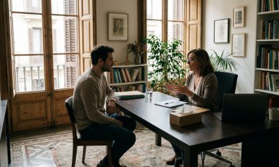 Expat in a calm counselling session with a psychologist in a bright Spanish office