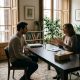 Expat in a calm counselling session with a psychologist in a bright Spanish office