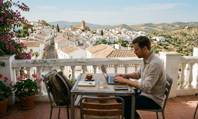Expat working securely on a laptop on a terrace in Andalusia